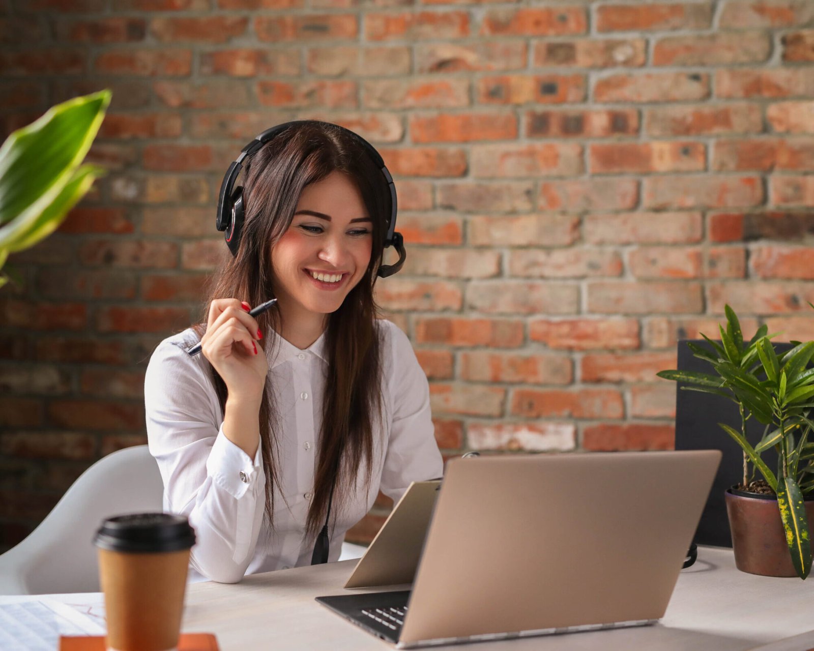 Woman working in call center as dispatcher